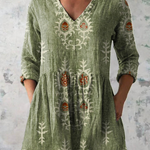 Elise soft green print V-neck blouse, front view