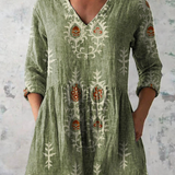 Elise soft green print V-neck blouse, front view