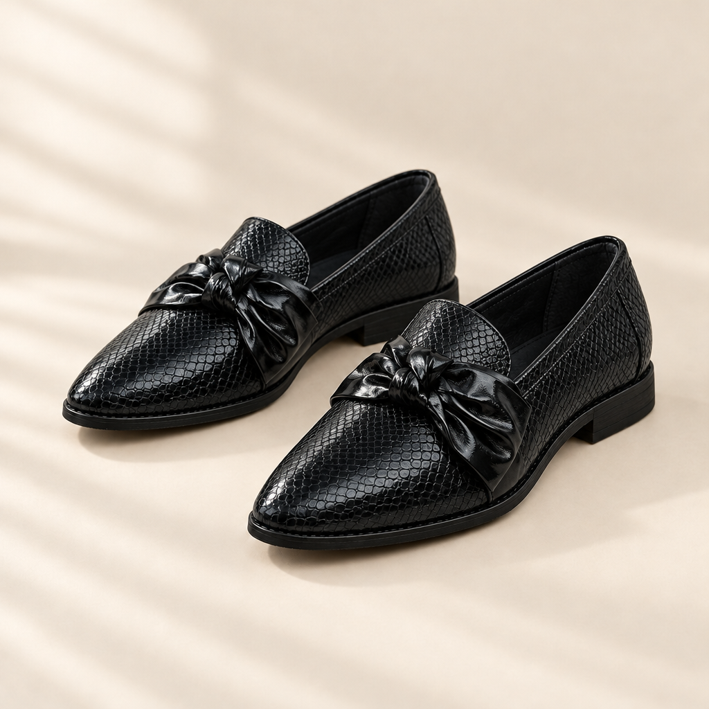 Chelsea bow detail pointed flats, front view