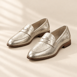 Callistia metallic gold loafers, front view