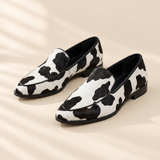 Becca cow print loafers, front view