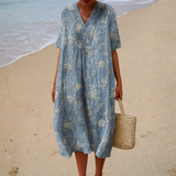 Pale blue floral print summer dress, front view