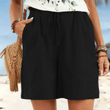 Casual linen style drawstring shorts with pockets in Black, front view
