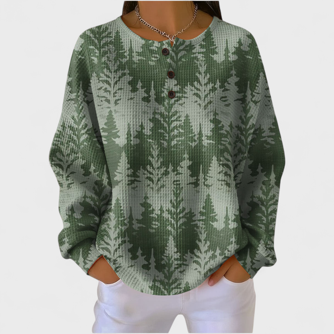 Isla green Christmas tree jumper, front view