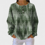 Isla green Christmas tree jumper, front view