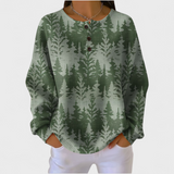 Isla green Christmas tree jumper, front view