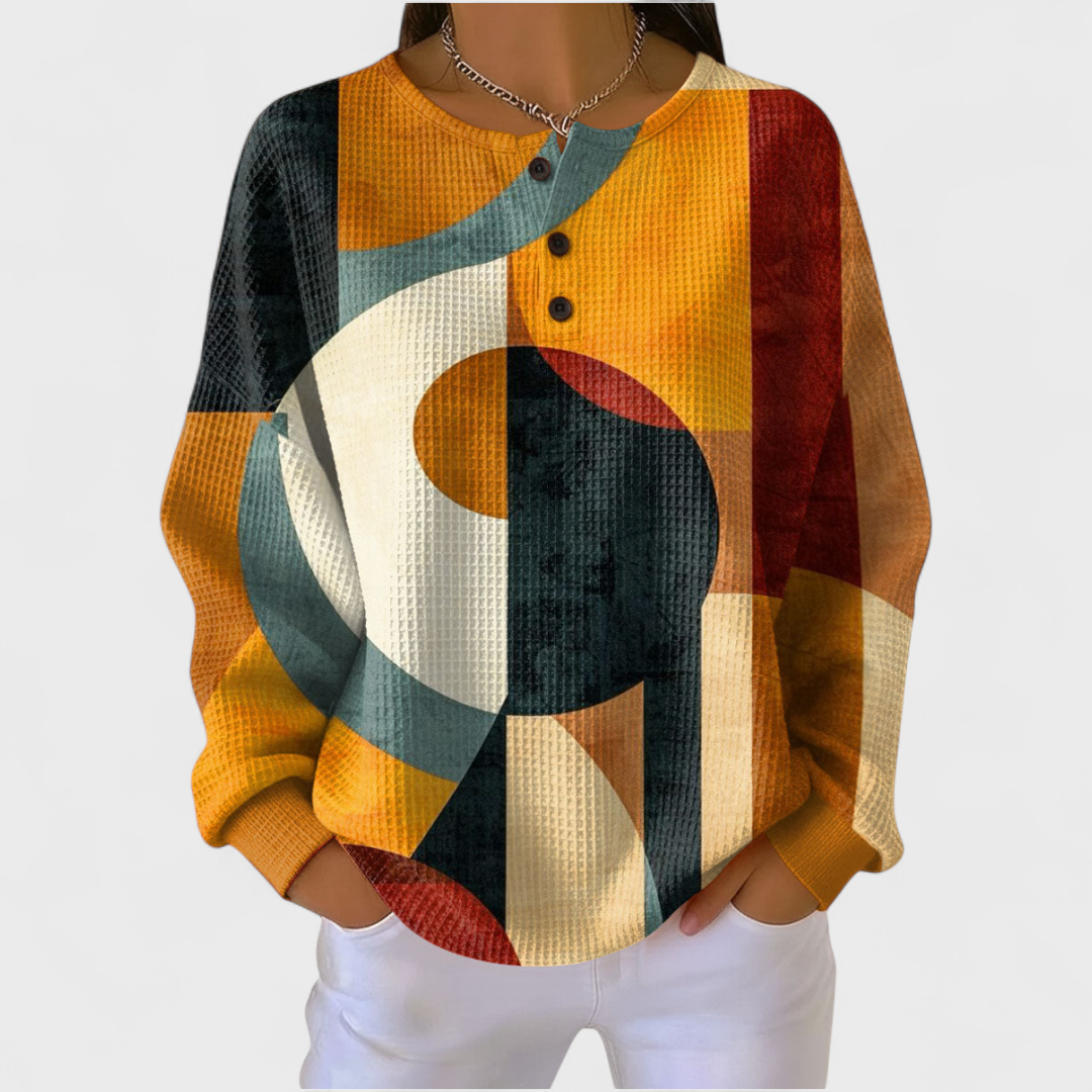 Leah geometric retro print jumper in Orange, front view