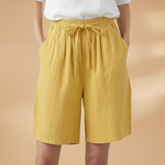 Wide leg linen drawstring shorts in Yellow, front view