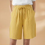 Wide leg linen drawstring shorts in Yellow, front view