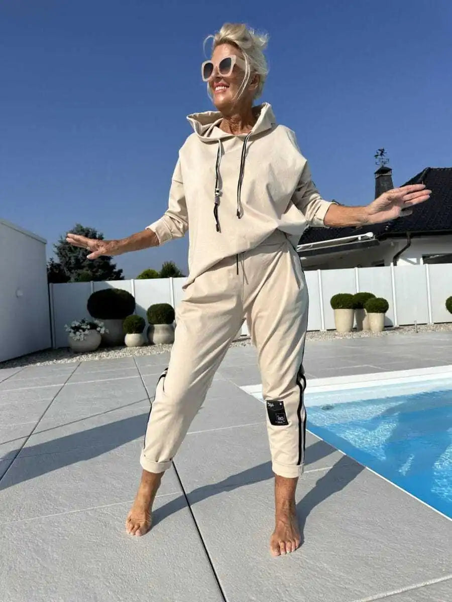 Olyra two-piece hoodie and jogger set in Apricot, front view