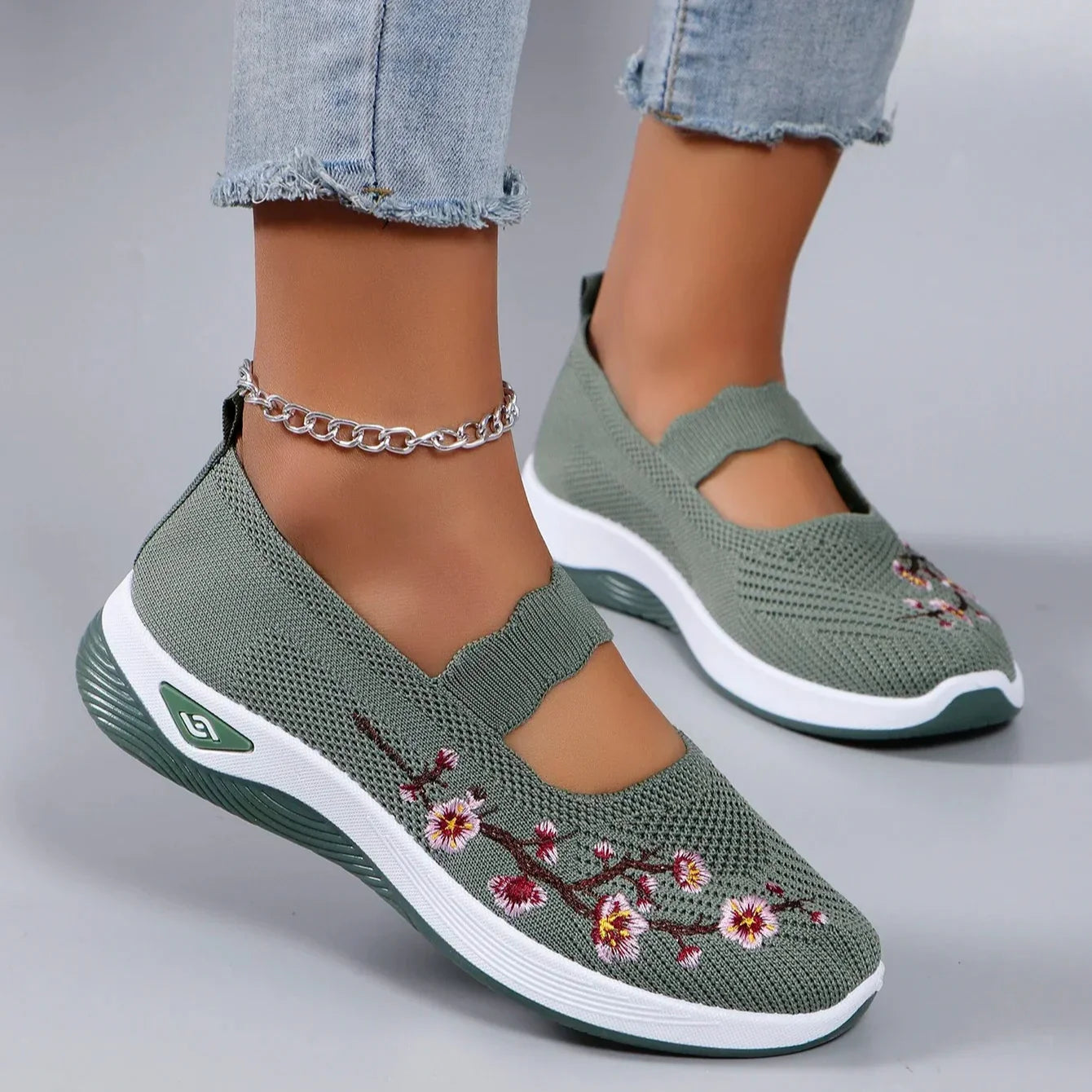 Fajon floral embroidered trainers in Green, front view