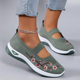 Fajon floral embroidered trainers in Green, front view