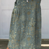 Ida teal botanical print maxi skirt in Dark Green, front view