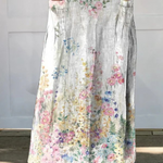 Clara floral print maxi skirt in White, front view
