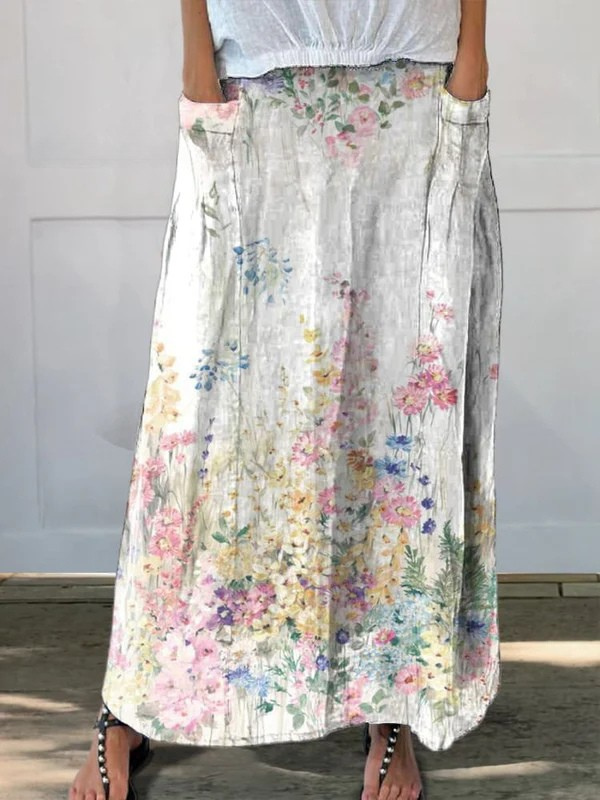 Clara floral print maxi skirt in White, front view