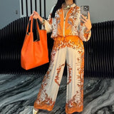 Elyra printed satin overshirt and trouser set in Orange, view 3