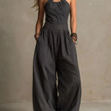 Adriana crossed halter neck jumpsuit in Black, front view